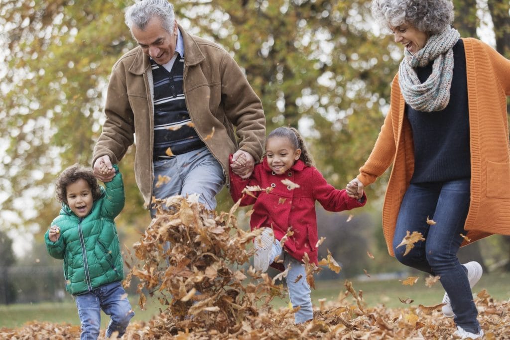 Playful grandparents in park